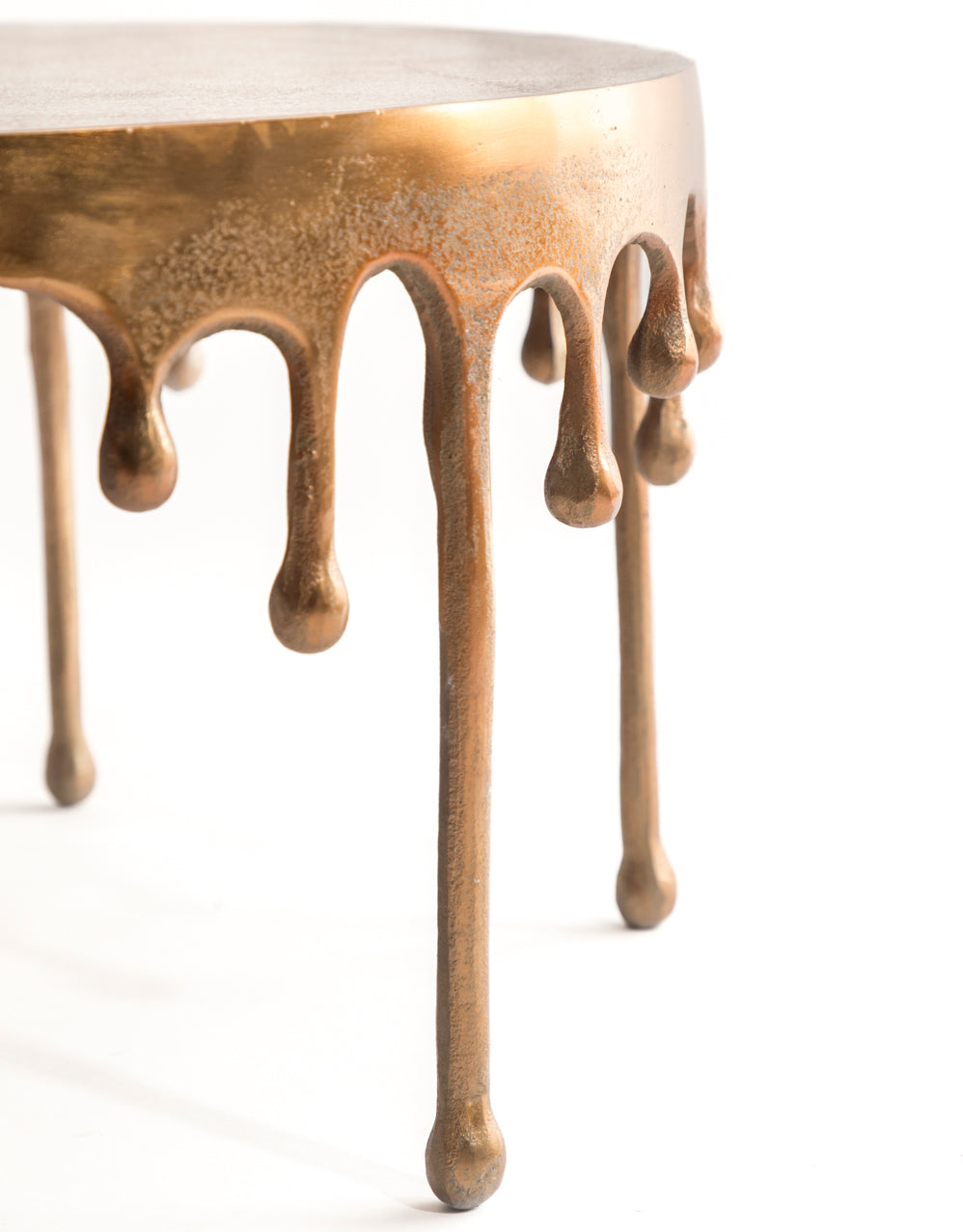 GOLD ALUMINIUM DRIP OVAL COFFEE TABLE